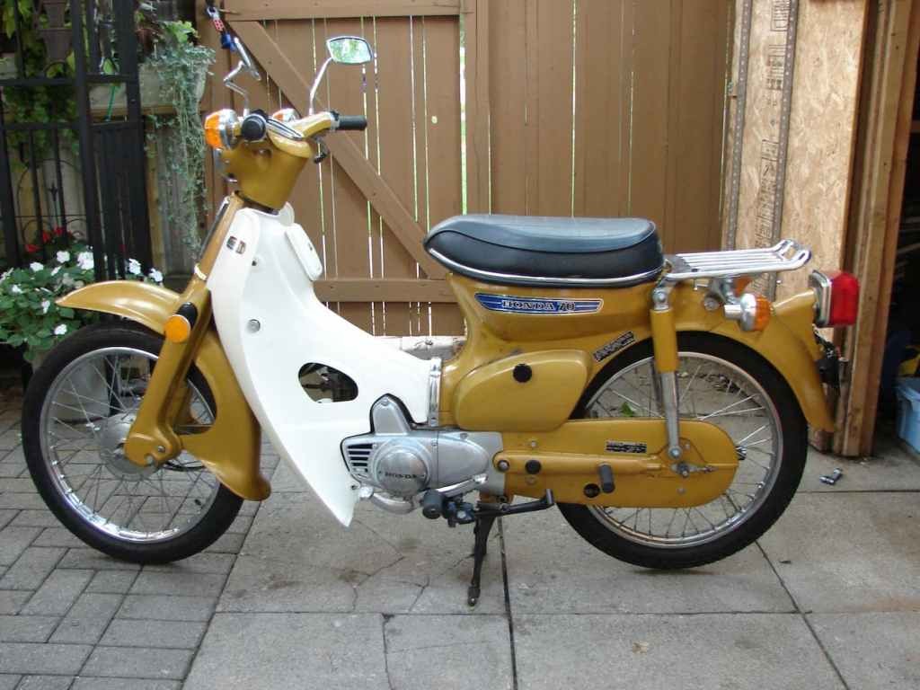 Hãy thử tưởng tượng một chiếc Honda Super Cub thập niên 1970 với mô-tơ điện mà xem