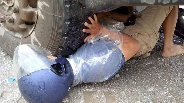 Người đàn ông thoát chết ngoạn mục ngay dưới bánh xe tải tại Quốc Lộ 70